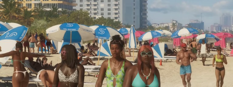 Пляж с отдыхающими людьми, зонтами Sol Sisters и высотными зданиями на фоне. Люди загорают, гуляют и наслаждаются летним днем.