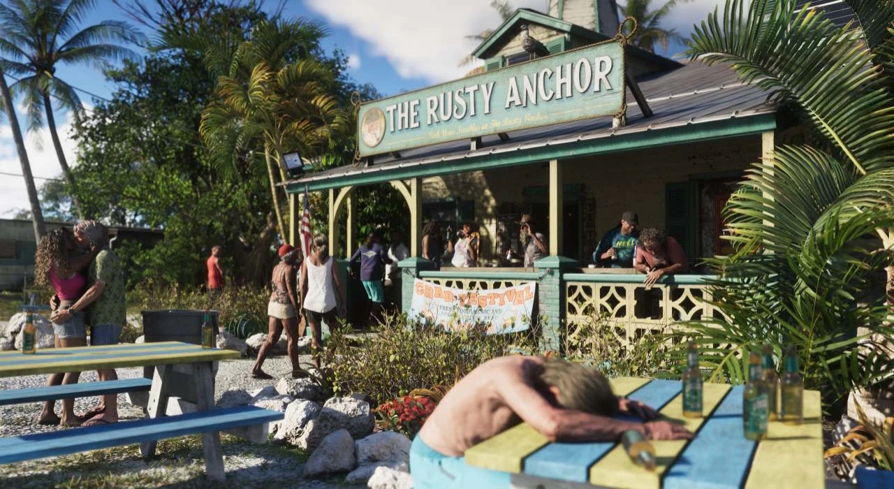Летний день у бара The Rusty Anchor: люди отдыхают, общаются, пьют напитки, пара целуется, мужчина спит за столом, вокруг пальмы и зелень.
