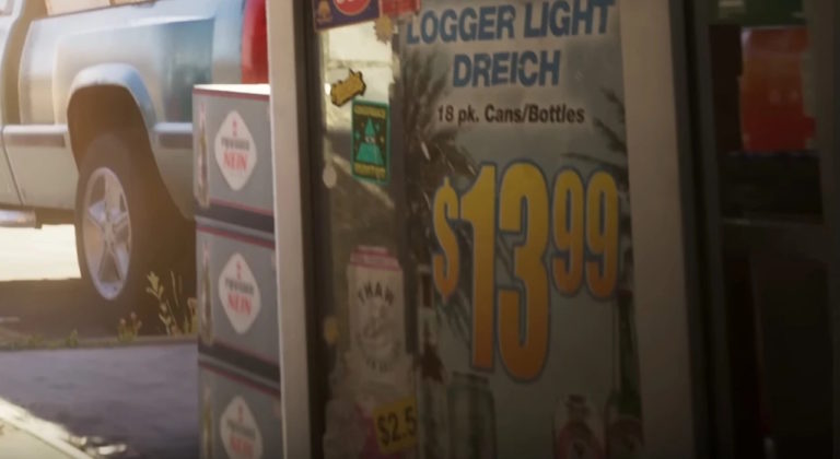 Рекламный плакат на витрине магазина с предложением пива Logger Light Dreich по цене $13.99 за упаковку из 18 банок или бутылок. Рядом стоят коробки с напитками и припаркован серебристый пикап. На стекле также видны наклейки и ценник $2.5. Солнечный день, часть улицы и автомобиля видна на заднем плане.